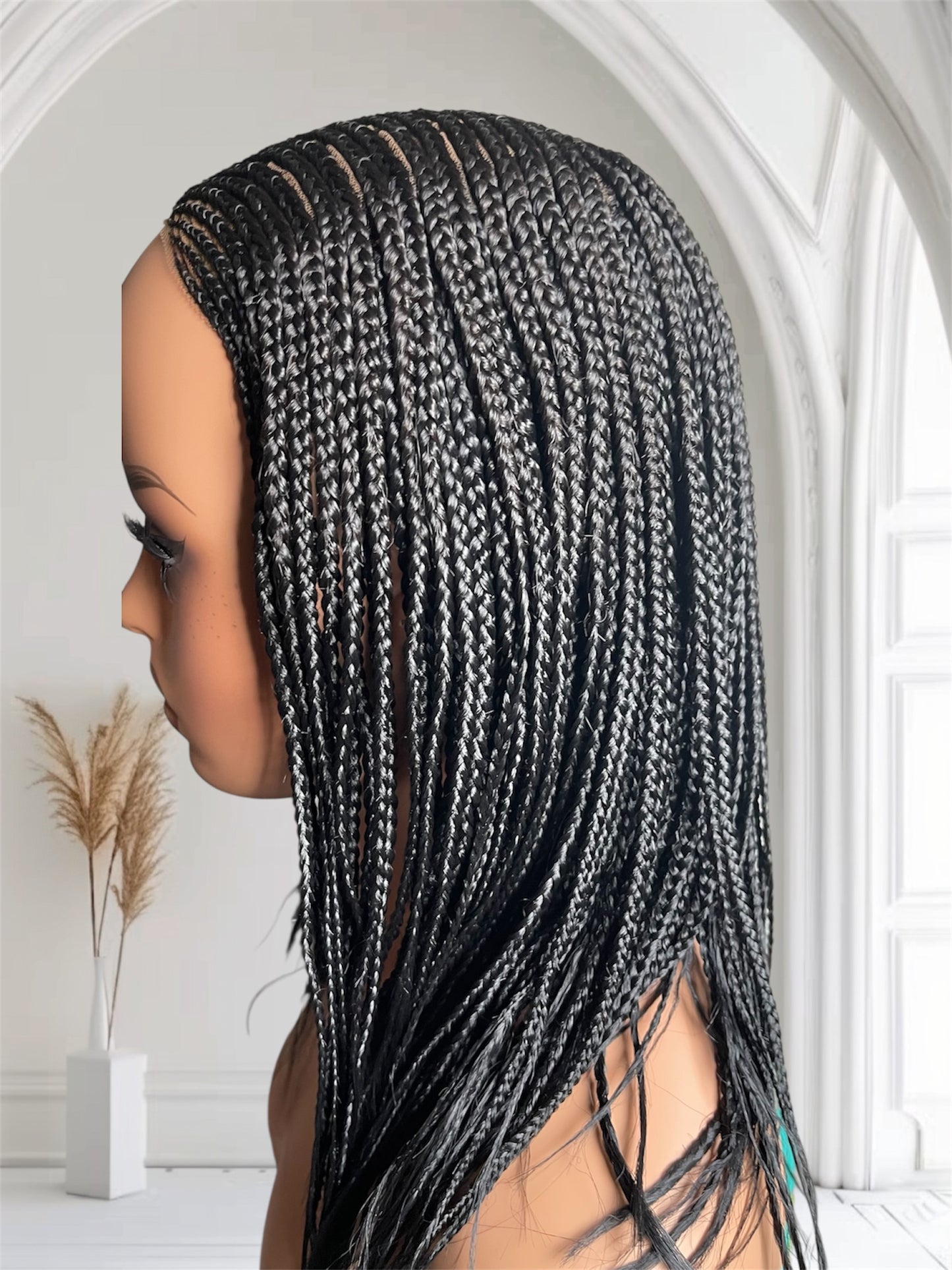 Center part Cornrow Black